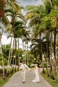 BRadie and groom waking at the Bahia Principe Grand Jamaica