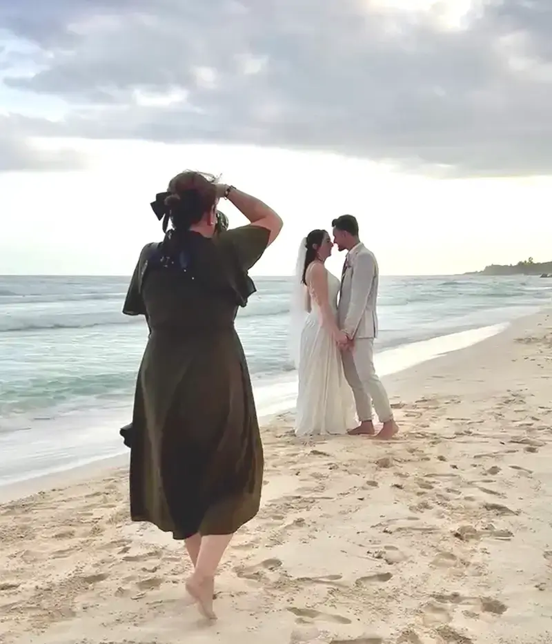 Annie Simard who photograph a bride and broom on the Playacar's beach