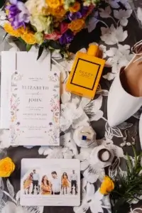 Flat lay wedding in Quebec City with Gucci perfume and stationery