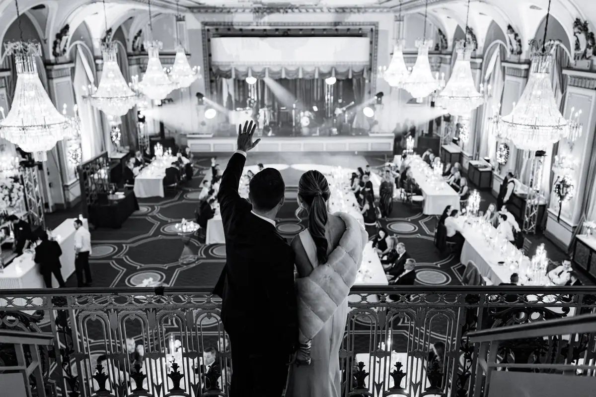 Bride and Groom say hello to their guest with overview of the ballroom at the Fairmont Chateau Frontenac