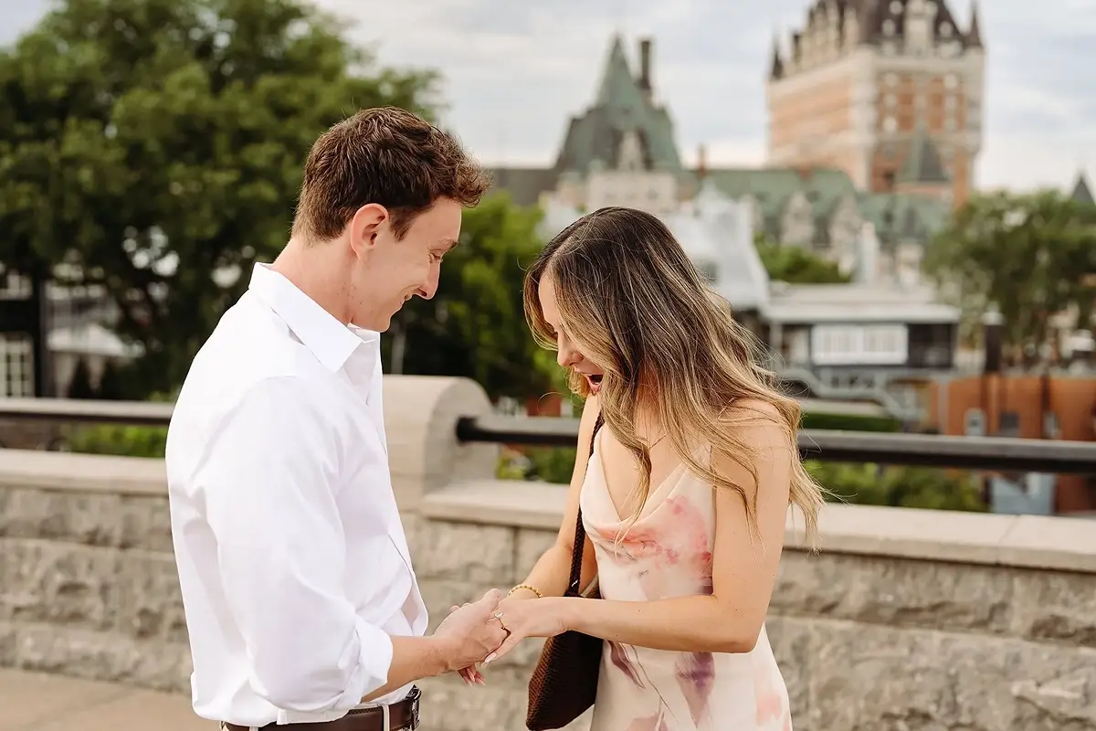 Girl looking at her new engagement ring