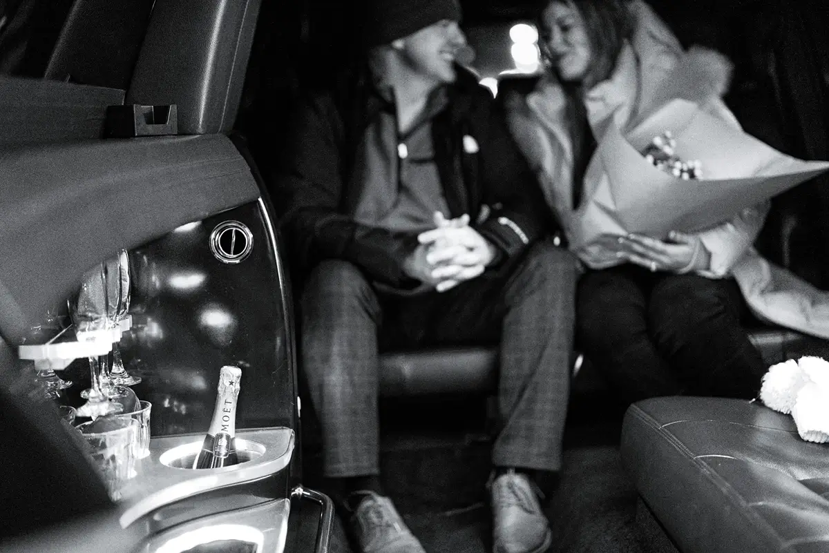 Limousine ride with a new engage couple.