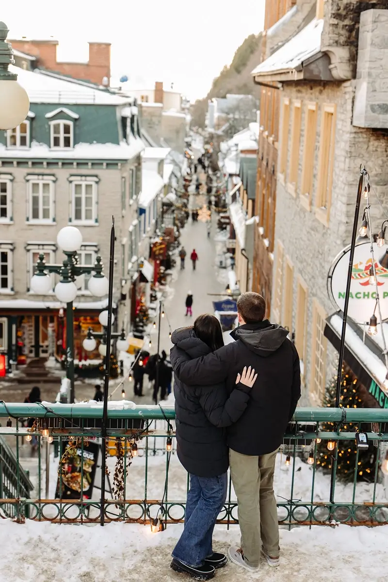 Couple walks in Old Quebec City