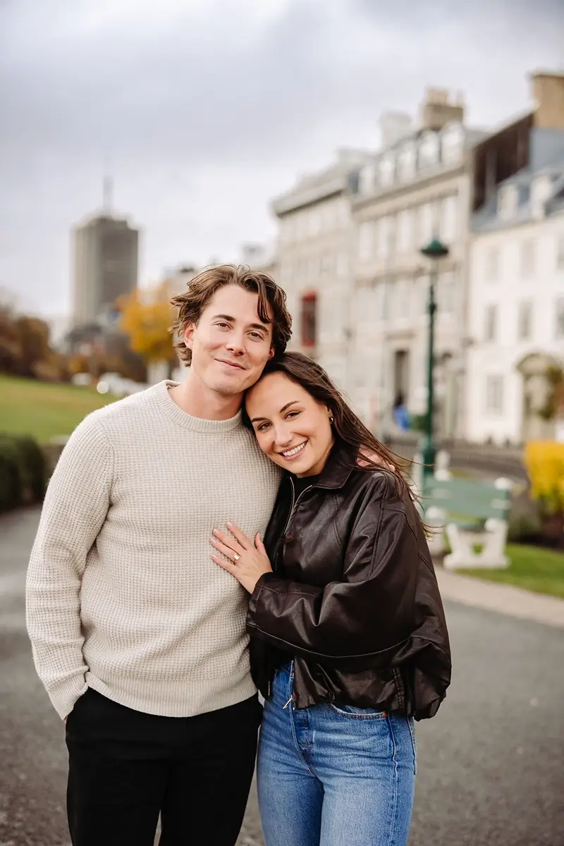 New engaged couple in front of Quebec City