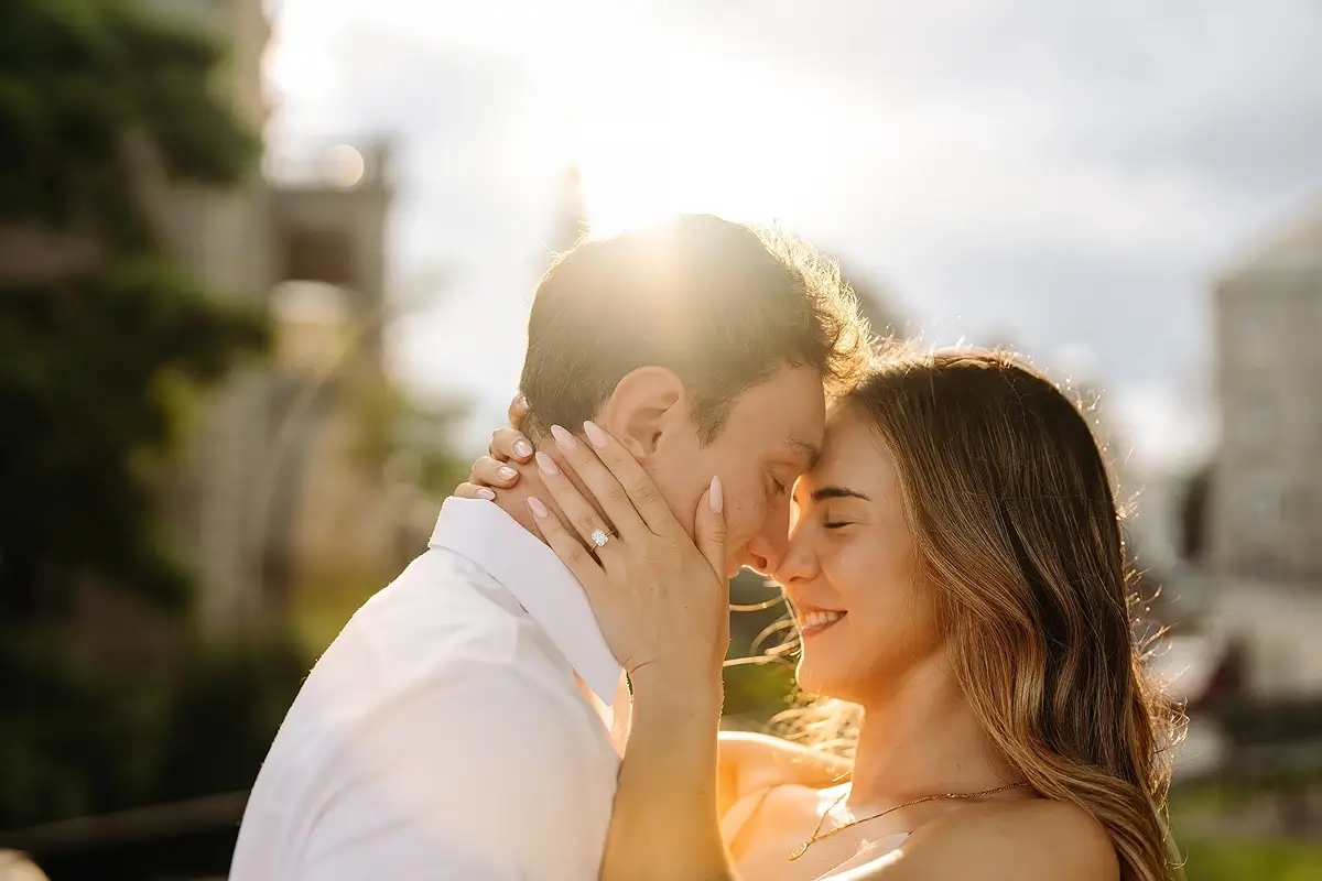 Newly engaged couple at sunset