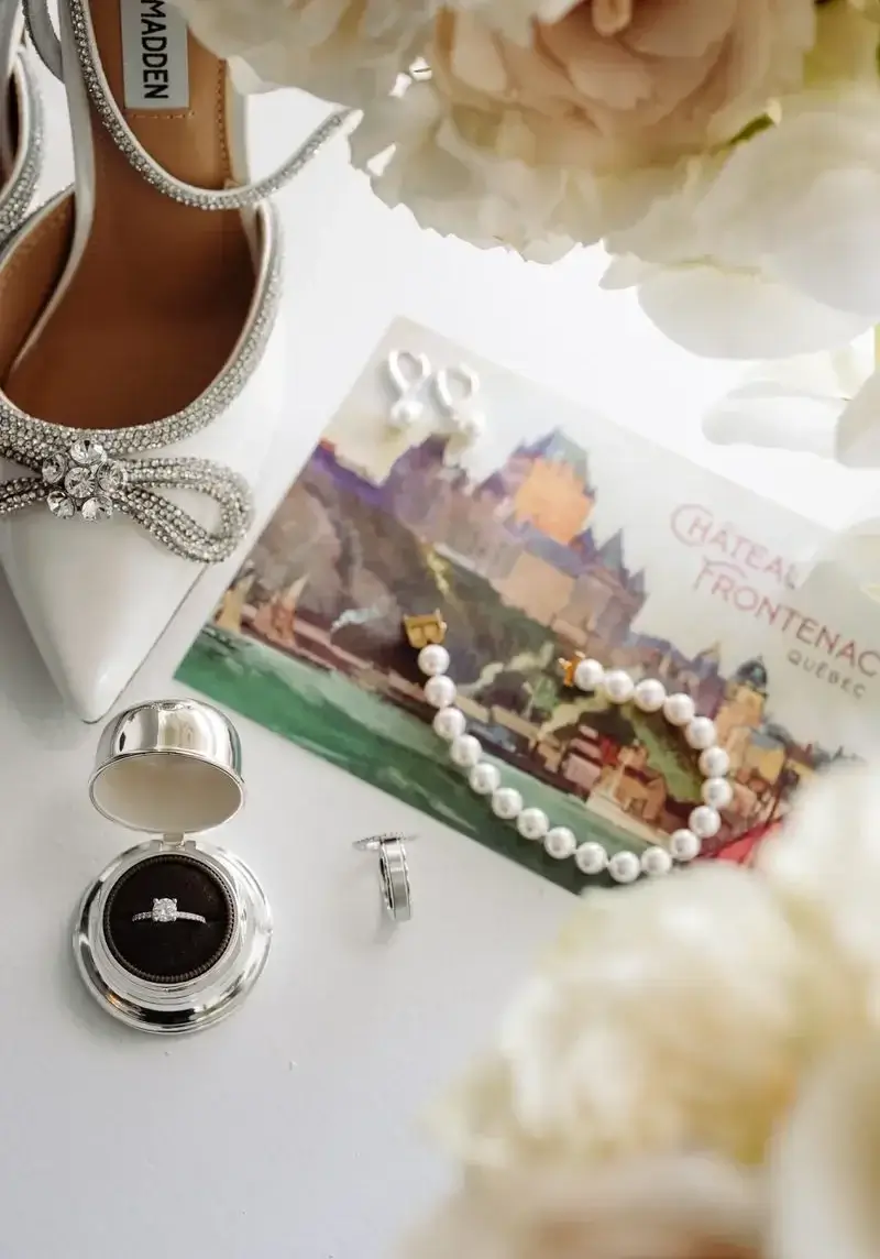 Flat lay of the bride's accessories at the Chateau Frontenac Quebec